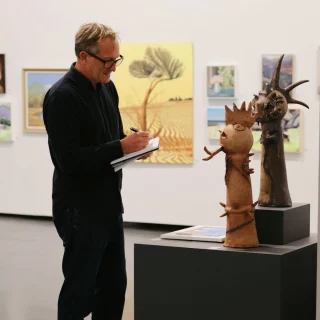 Our Curator and Collections Manager, Paul Howard, was the judge for the Liverpool Art Society’s 27th Annual Exhibition this year! 
Paul had the immense task of selecting the winners for 8 categories including youth. 
The launch was a huge success with an incredible display of Liverpool local talent and their creative community, facilitated by the Liverpool Art Society. 
View all the artworks until 7 September, visit @liverpoolpowerhouse for more information.  @blacktowncitycouncil @paulrhoward @liverpoolpowerhouse  @liverpoolartsociety  #BlacktownArts #BlacktownCityCouncil #LiverpoolPowerhouse #LiverpoolArtSociety #Judge #Curator #Collections  --- 
Images: Image 1 and 3, Paul Howard judging artworks and with Luke Letourneau, Jenny Phillips,  Anne Picalovski and Alex Mitchell Curator,  for Liverpool Art Society 27th Annual Exhibition, 2025, photo by Pixel Kate Photography. Image 2, Liverpool Art Society 27th Annual Exhibition Awards, 2025, photo by Chantel Bann Photography  ID: Image 1 showcases Paul Howard observing and judging an artwork from the exhibition. Image 2 shows Paul Howard and artist, Charlie Roppola Wells, on stage for the award ceremony. Image 3 shows Paul Howard with the Liverpool Powerhouse and Liverpool Art Society teams