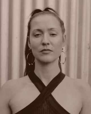 Meet Sonya Holowell and JWPaton, performing this Friday at the opening of Ghosts in the Kitchen.  Sonya is a voice and text artist of Dharawal and Inuit heritage, and JWPaton is a Yuin composer living and working on the unceded lands of Dharug Nation.  They will respond to Ghosts in the Kitchen through sound, including Sonya’s vocal improvisations and JWPaton’s field recordings and samples.  The night will also feature performances by: 
Amy Flannery and Aroha Pehi 
Lucy Norton and Anne-Marie Te Whiu  Exhibition guest curated by Rebecca Ray 
Performance program curated by Verónica Barac-Gomez  Find the full program via our website! 
Free to attend with registrations.  @blacktowncitycouncil @creatensw @sonyaholowell @jwptn @brekkyyy  #BlacktownArts #BlacktownCityCouncil #GhostsintheKitchen #Opening #Performances  --- 
Images: Sonya Holowell, photo by Ella Holowell and JWPATON, photo by Traianos Pakioufakis  ID: Image 1, showcased a woman with a serious and blank look on her face as she looks into the camera, she is wearing dark clothing with her hair in a ponytail, the image is a greyscale tone. Image 2, shows a man standing in front of a white wall, looking into the camera and not smiling, he is wearing a black hat and dark clothing, the image is in full colour.