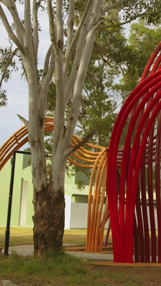 Rising from the ground, Timeflows invites you to reflect on the continuity of living culture.  Created by Dharug artist Shay Tobin, alongside Chris Fox and Michael Cohen, they brought together geological and topographic data sets from the area, this element of the collaborative artwork, aids in exploring the history of land and water in and around Angus Creek. 
Can you see the stories that flow through the strands? 
Visit the Blacktown International Sports Park to check it out and reflect on community. 
Artwork design detailing, manufacturing and installation by @forge.outdoorsau 
@blacktowncitycouncil @citypeoplesydney @nagi3108 @shaytobin @studiochrisfox @foxyalot 
#BlacktownArts #BlacktownCityCouncil #Timeflows #Artwork #Launch #DisabilitySportsCentre 
--- 
Video: Uncle Chris Tobin for Timeflows, 2025, by Dayvis Heyne