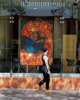 Starphire Jacobs’ public artworks at the Max Webber Library continue to build on the themes of our 2025 exhibition, ‘Ghosts in the Kitchen guest curated by Rebecca Ray’, exploring food and culture, generational connections, and the relationship between past, present, and future, with a focus on the reclamation of First Nations culture and ritual.  Take a moment to walk past the Max Webber Library windows and experience the works in-person.  Until 28 February 2026. 
More info via link in bio  @blacktowncitycouncil @creatensw @snarphe  #BlacktownArts #BlacktownCityCouncil #MaxWebberLibrary #StarphireJacobs 
---  Images: Starphire Jacobs with their work ‘Tastes like Trauma’, 2025, courtesy of Blacktown Arts 
ID: Images showcase the artwork 'Tastes like Trauma' by Starphire Jacobs, on Max Webber Library windows.